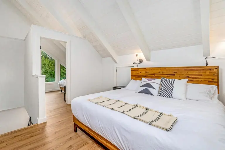 Two upstairs bedrooms in Tidal House Chalet 6.