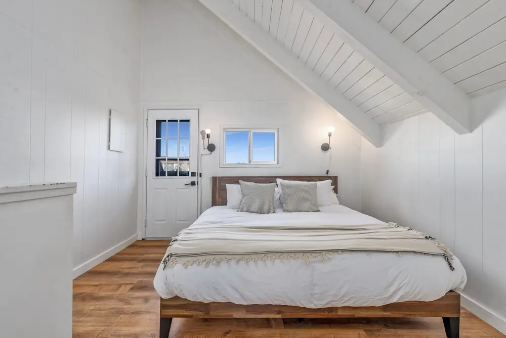 Bedroom inside a Tidal House chalet